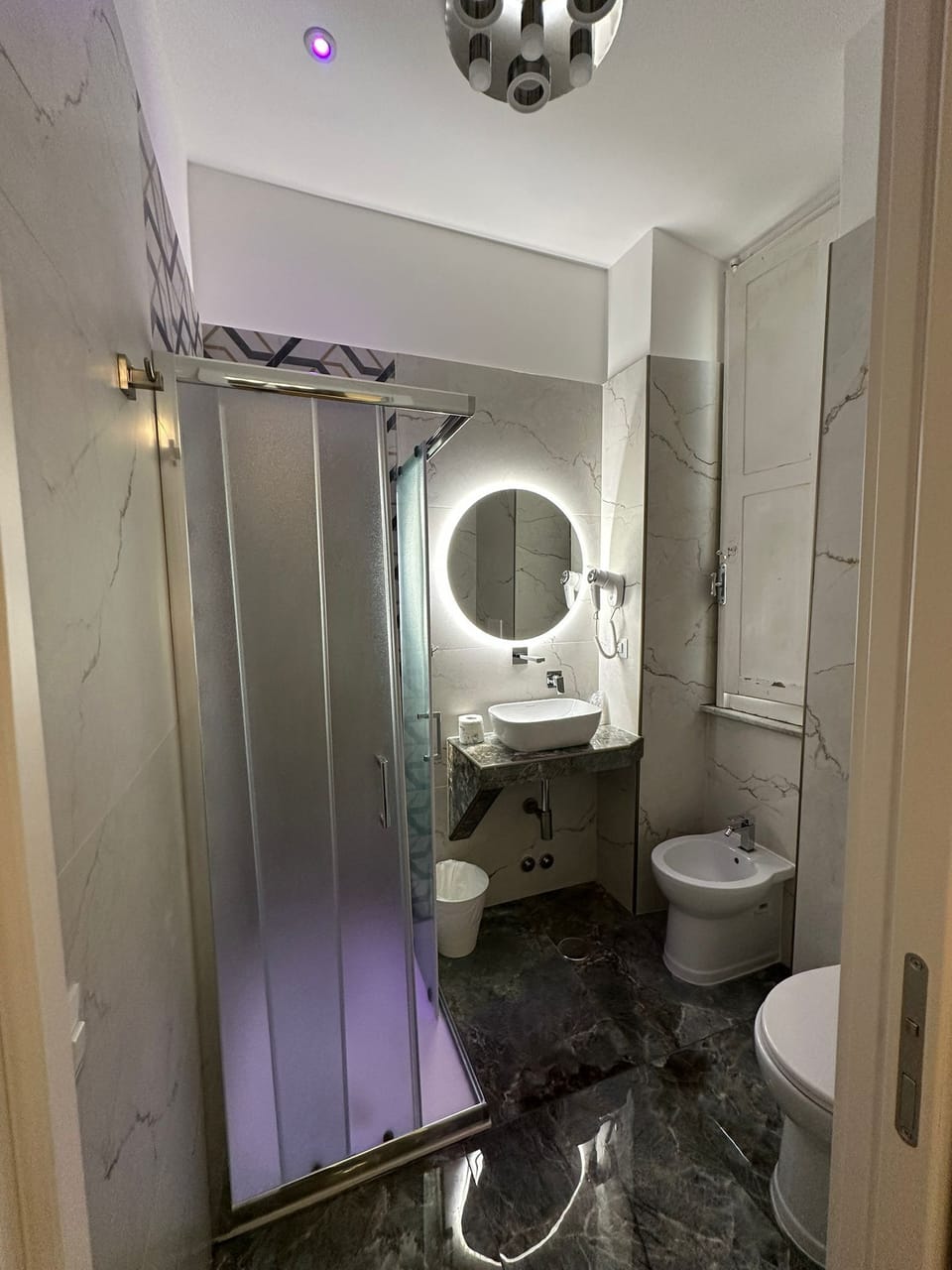Shower, hair dryer (on request), towels, soap