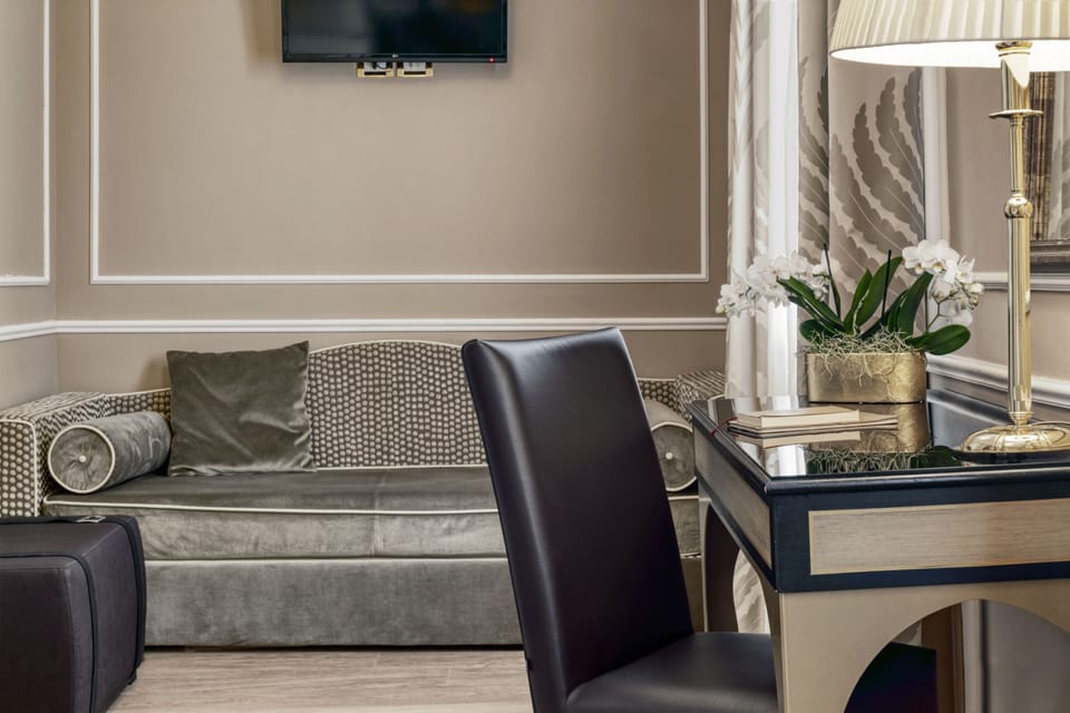 Quadruple Room | Down comforters, minibar, in-room safe, desk