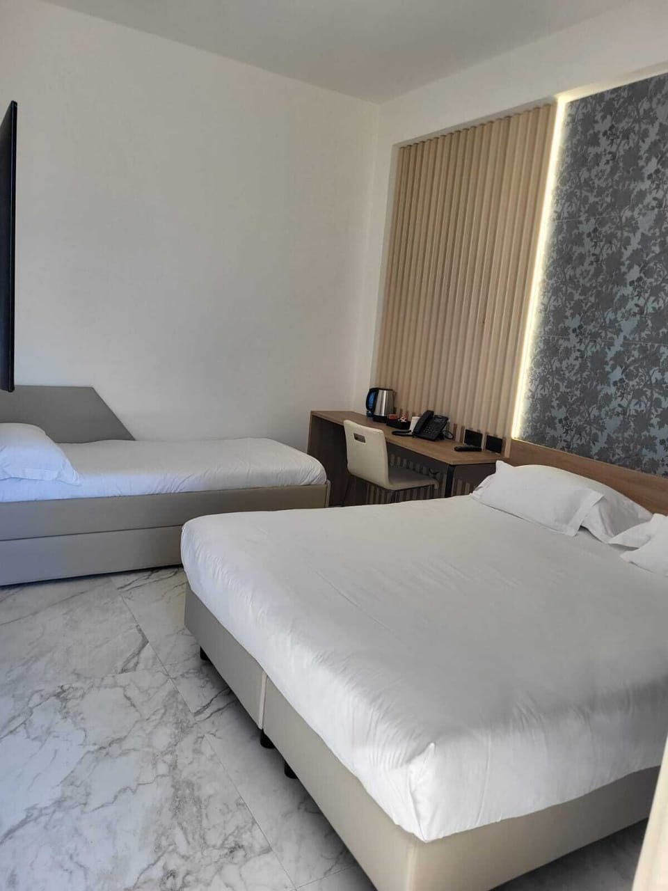 Superior Triple Room | Minibar, in-room safe, desk, soundproofing