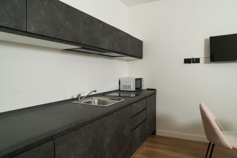 Deluxe Triple Room | Private kitchen