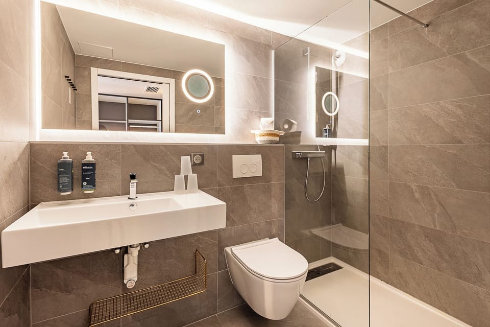 Triple Room | Bathroom | Shower, eco-friendly toiletries, hair dryer, heated floors