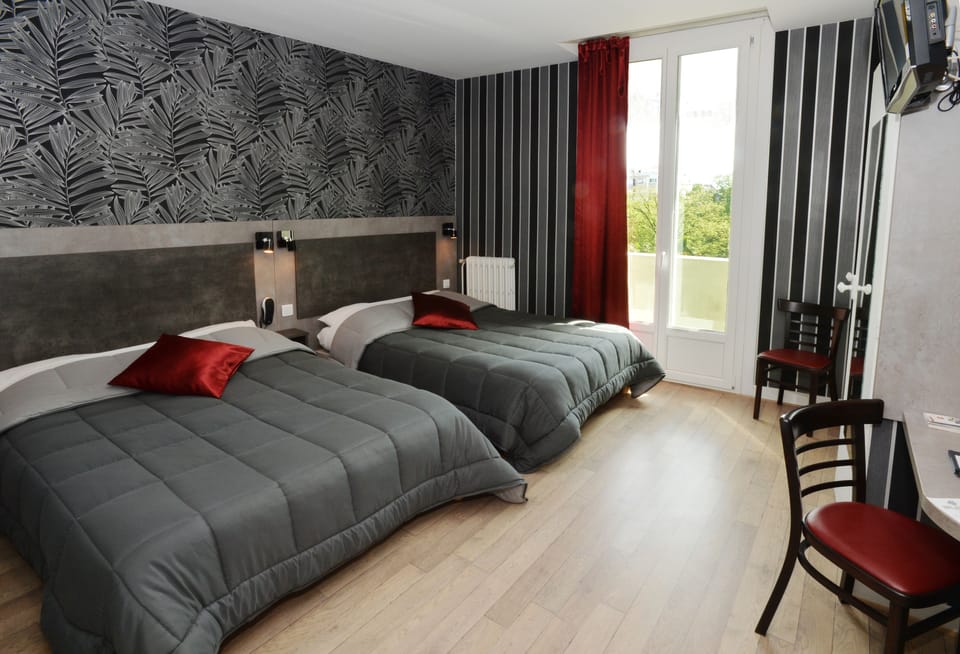 Comfort Quadruple Room, 2 Double Beds | 1 bedroom, individually decorated, desk, blackout drapes