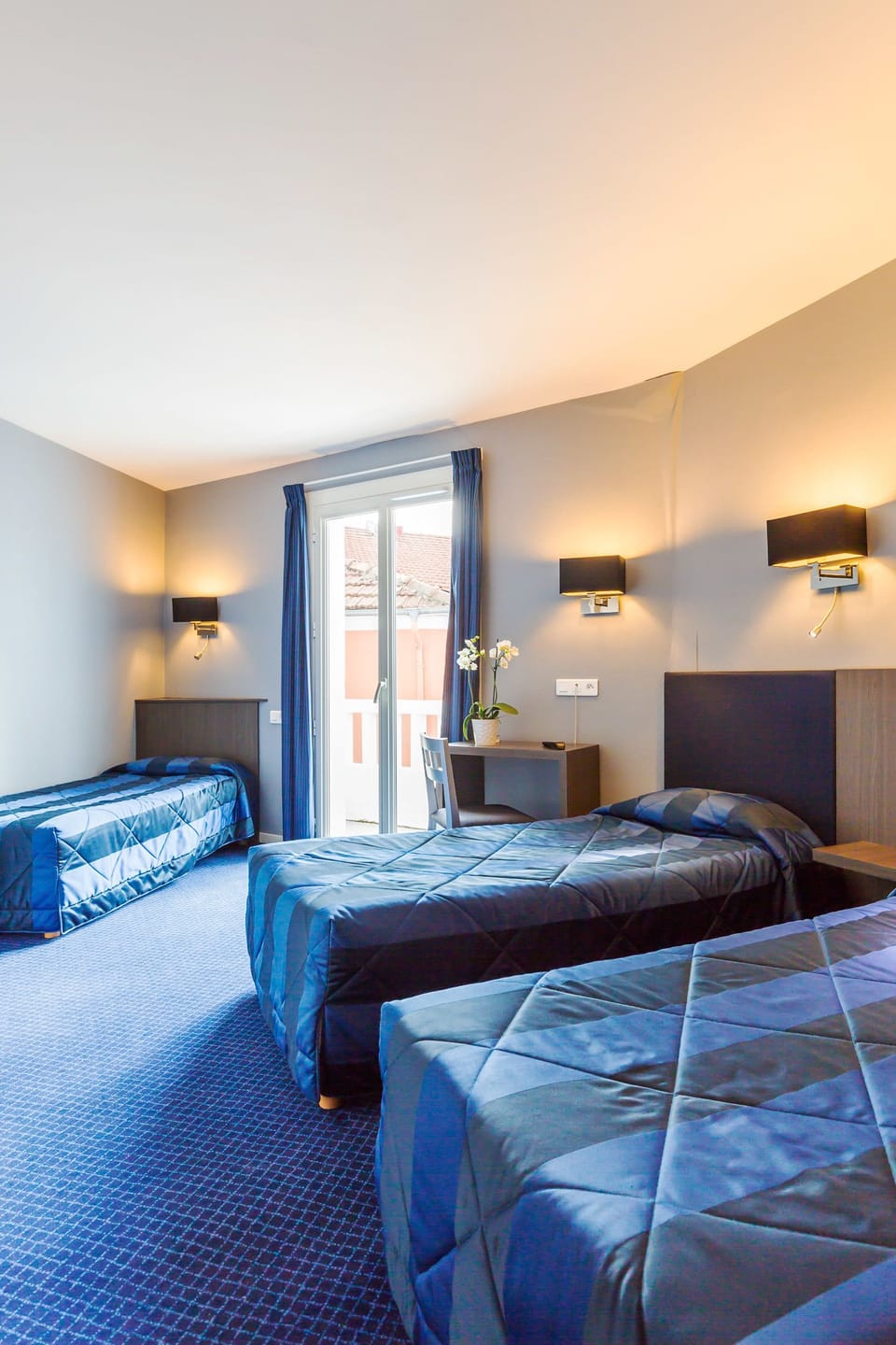 Triple Room | Desk, soundproofing, iron/ironing board, free cribs/infant beds
