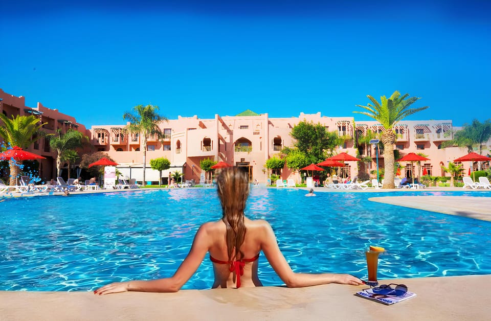 Indoor pool, outdoor pool, pool umbrellas, sun loungers