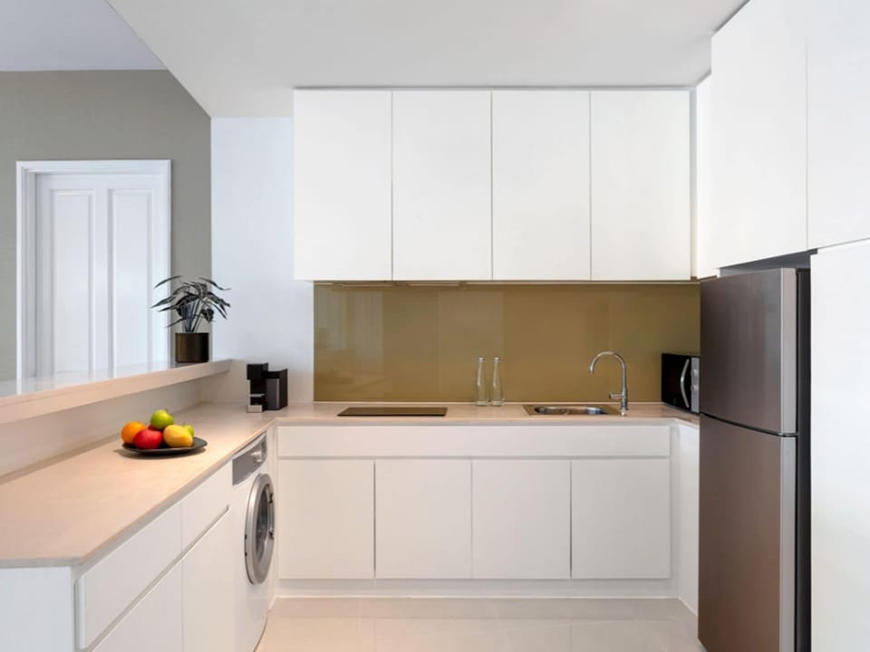 Deluxe Suite, 2 Bedrooms | Private kitchen | Fridge, microwave, stovetop, coffee/tea maker
