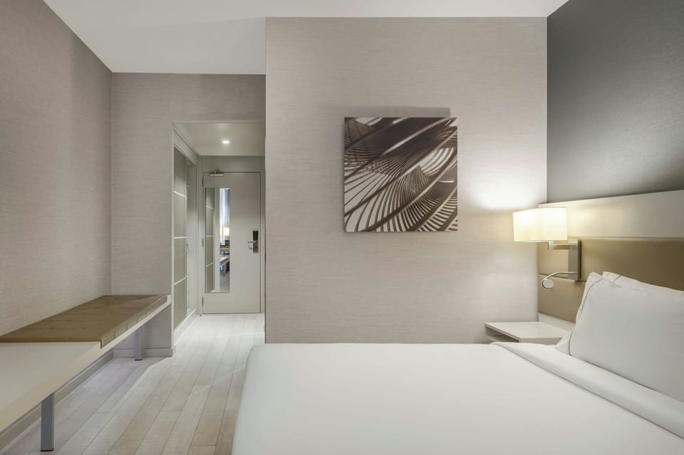 Premium bedding, minibar, desk, soundproofing