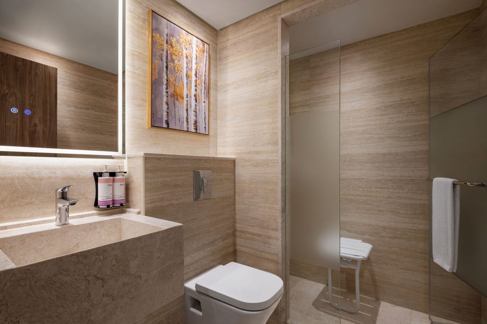 Deep soaking tub, eco-friendly toiletries, hair dryer, bathrobes