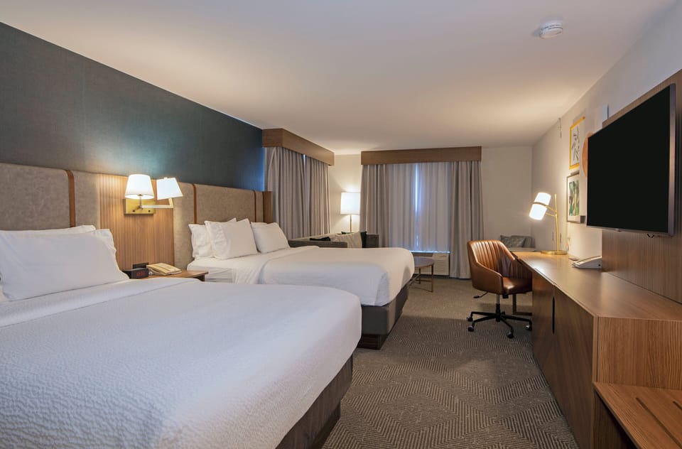 Standard Room, Multiple Beds, Corner | Pillowtop beds, in-room safe, desk, laptop workspace