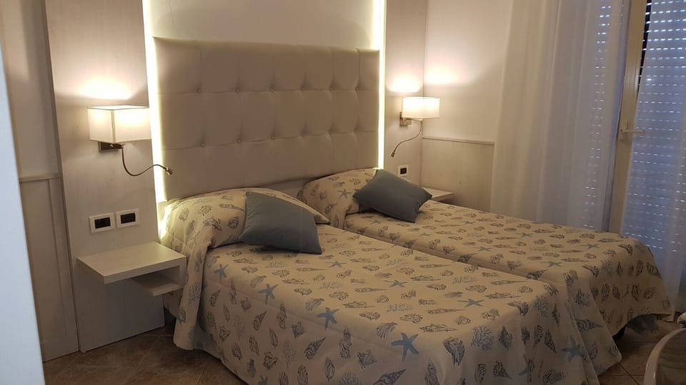 Double or Twin Room | Minibar, in-room safe, free WiFi, bed sheets