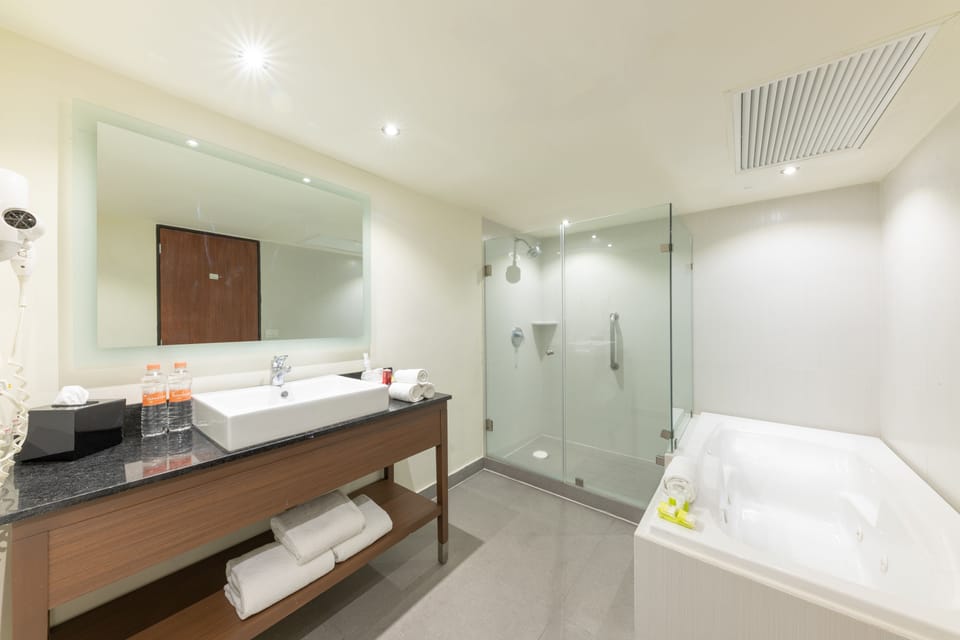 Suite, 1 Bedroom, City View | In-room safe, desk, blackout drapes, iron/ironing board
