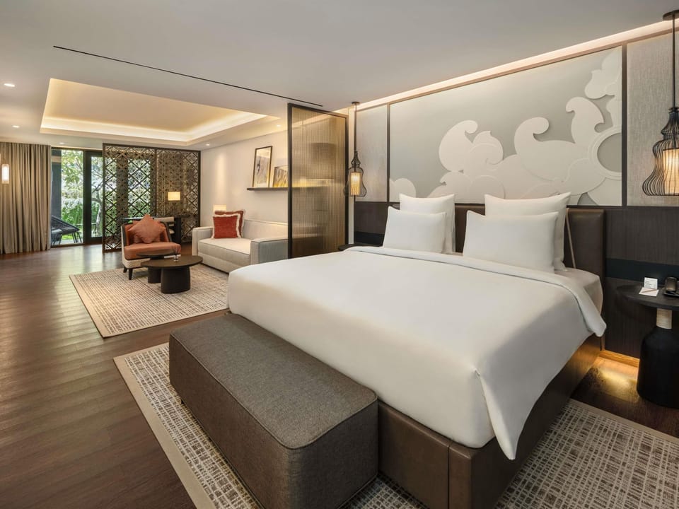 Family Room, 1 King Bed with Sofa bed, Garden View (Exclusive) | Premium bedding, in-room safe, desk, laptop workspace