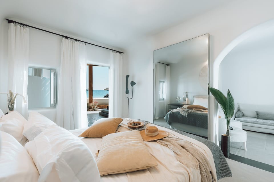 Premium bedding, down comforters, free minibar items, in-room safe