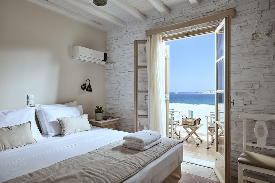Deluxe Triple Room, Sea View | Premium bedding, in-room safe, desk, soundproofing