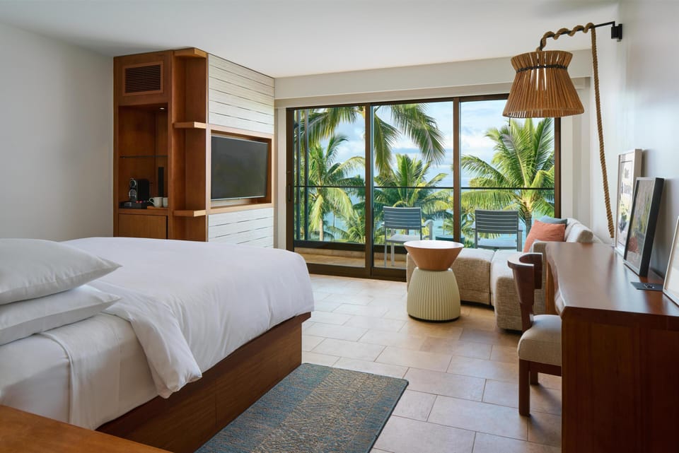 Premium bedding, down comforters, free minibar items, in-room safe