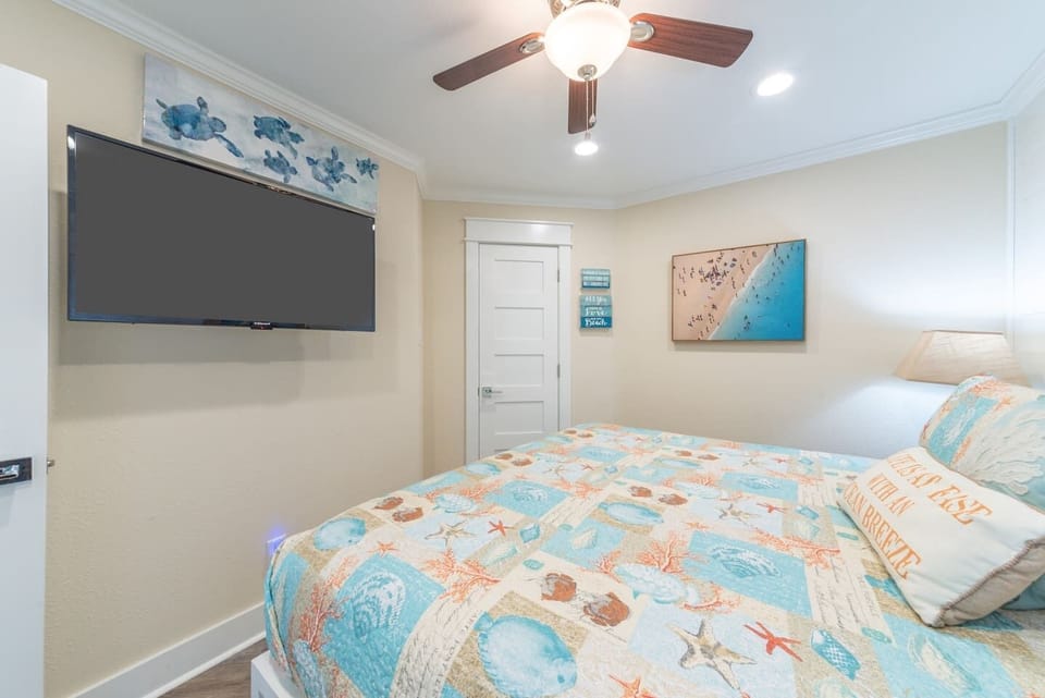 Flat panel tv above your bed.
