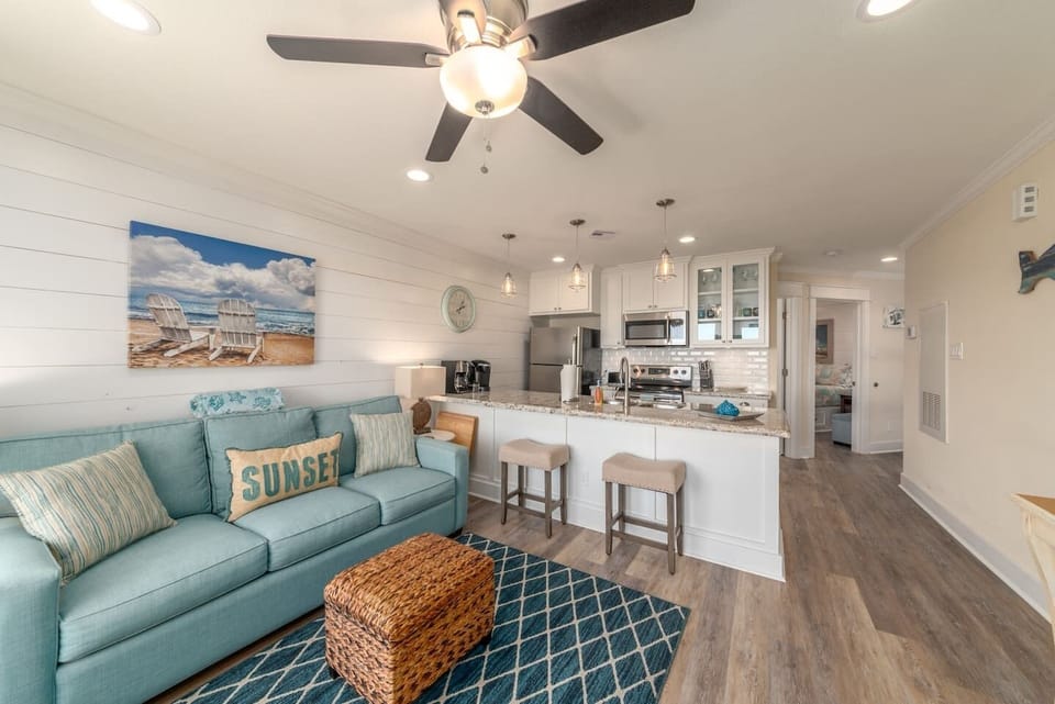 Open den and kitchen area. Super comfy upgraded queen sofa bed!
