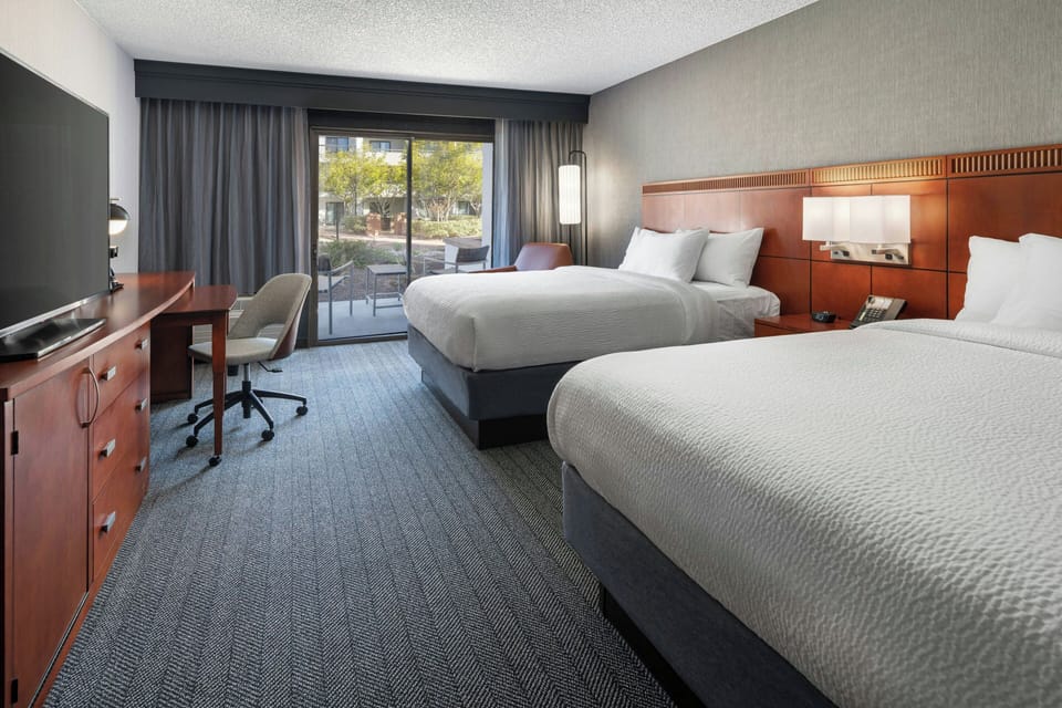 Premium bedding, down comforters, memory foam beds, in-room safe