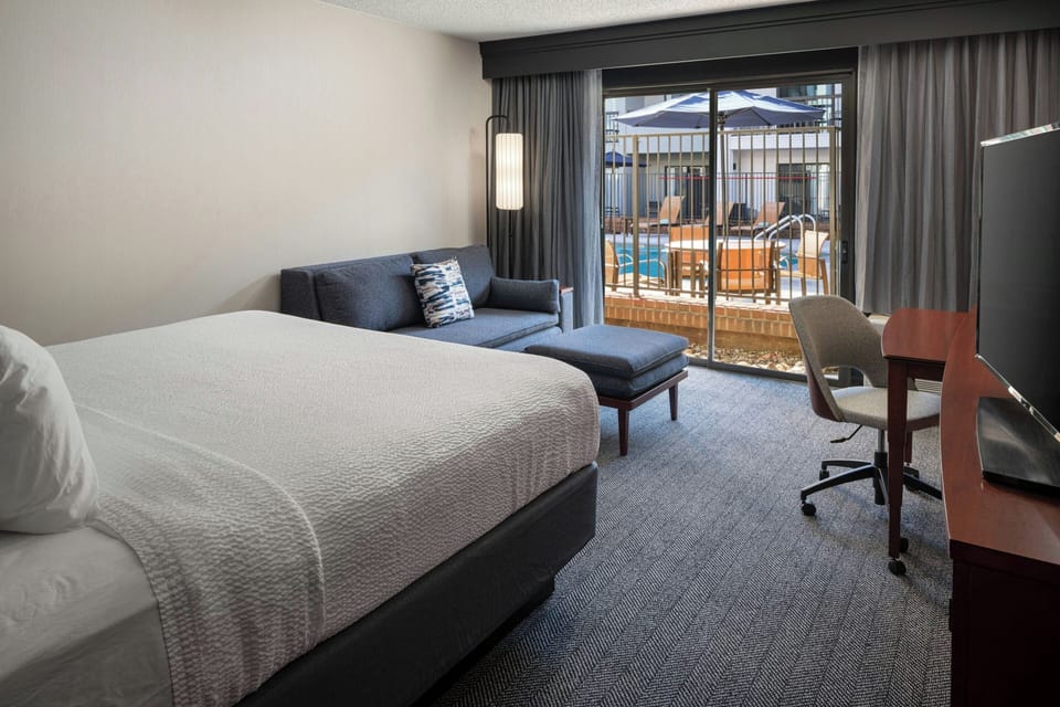Premium bedding, down comforters, memory foam beds, in-room safe