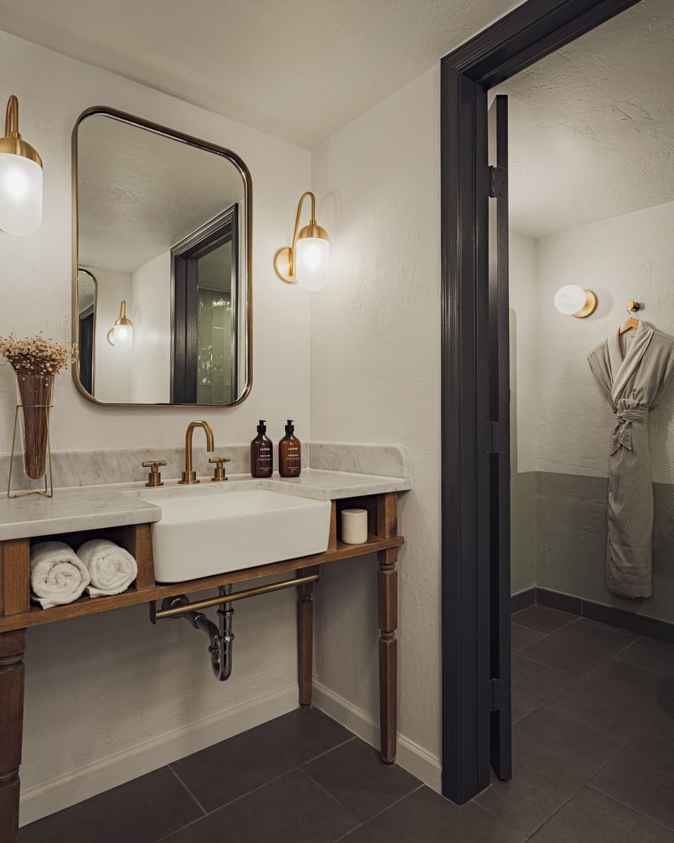 Shower, rainfall showerhead, designer toiletries, hair dryer