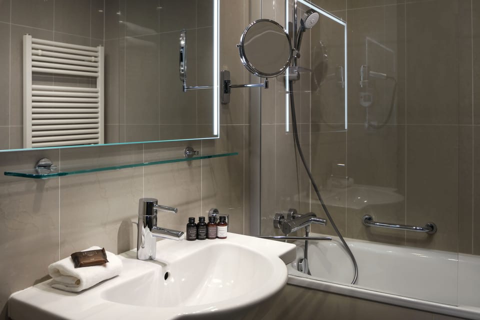 Combined shower/tub, free toiletries, hair dryer, bathrobes