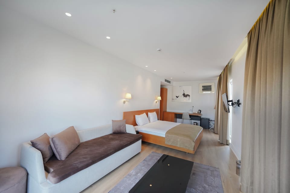 King Suite with Balcony | Premium bedding, down comforters, Select Comfort beds, minibar