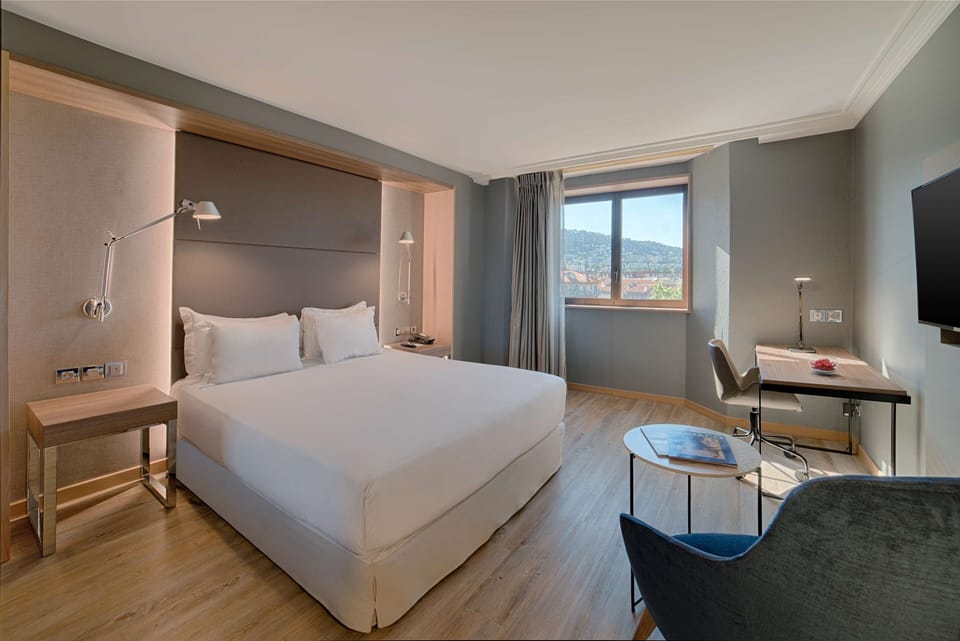 Select Comfort beds, minibar, in-room safe, desk