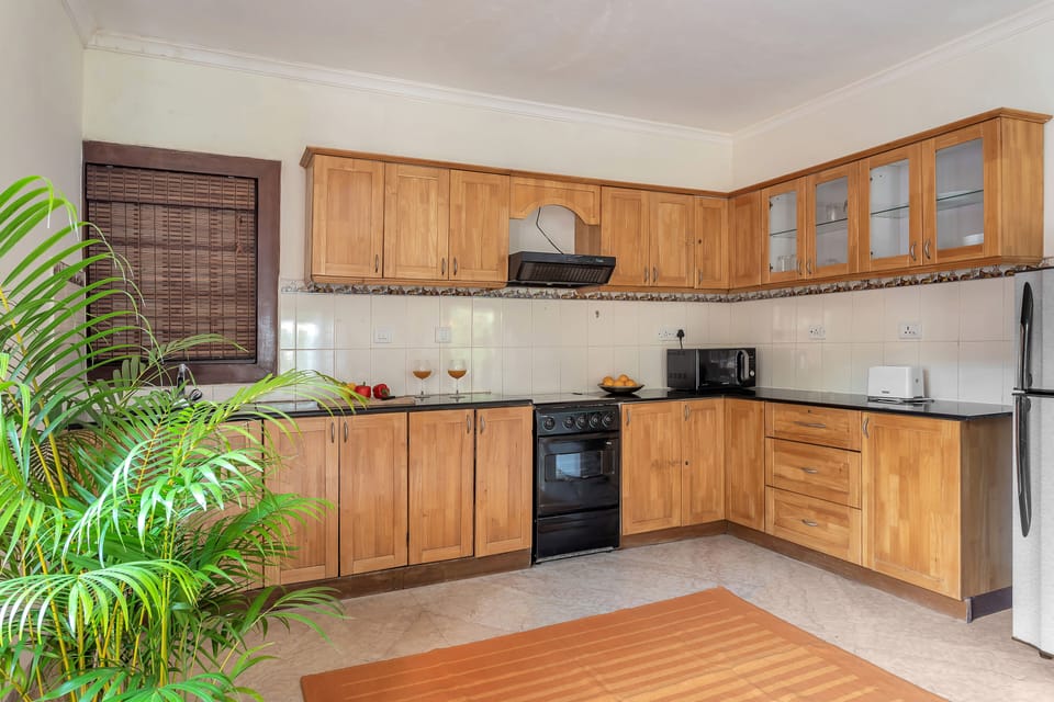 3 Bed Room Royal villa | Private kitchen | Microwave, oven, electric kettle, toaster