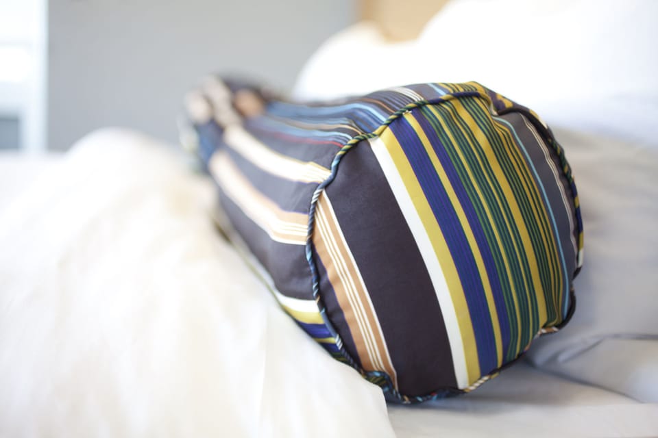 Premium bedding, down comforters, pillowtop beds, in-room safe