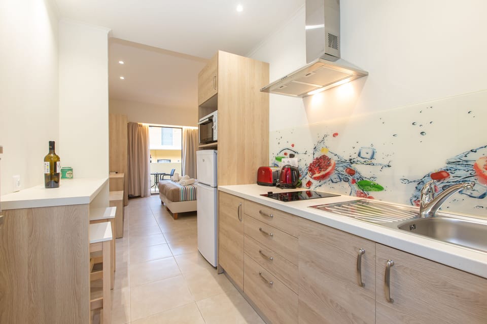 Superior Studio | Private kitchen | Full-size fridge, oven, stovetop, electric kettle