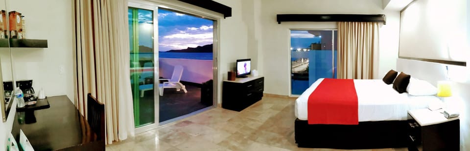 Suite, 1 King bed, Ocean View | In-room safe, individually decorated, individually furnished, desk