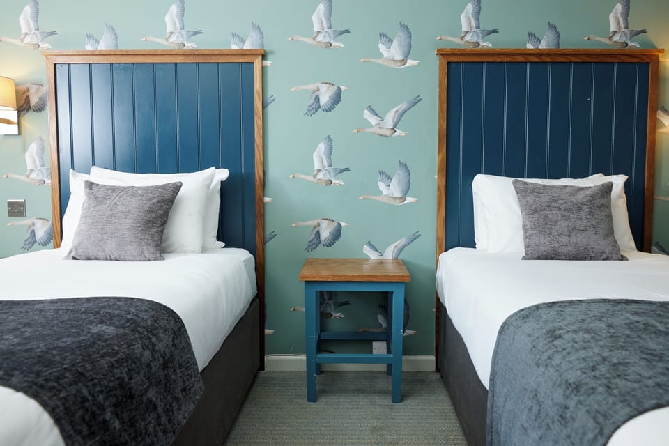 Twin Room | Desk, iron/ironing board, free WiFi, bed sheets