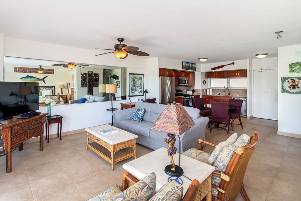 Living Room - Nicely furnished living area with sleeper sofa and flat-screen TV.  Fully equipped kitchen and dining area with dining table that seats four.