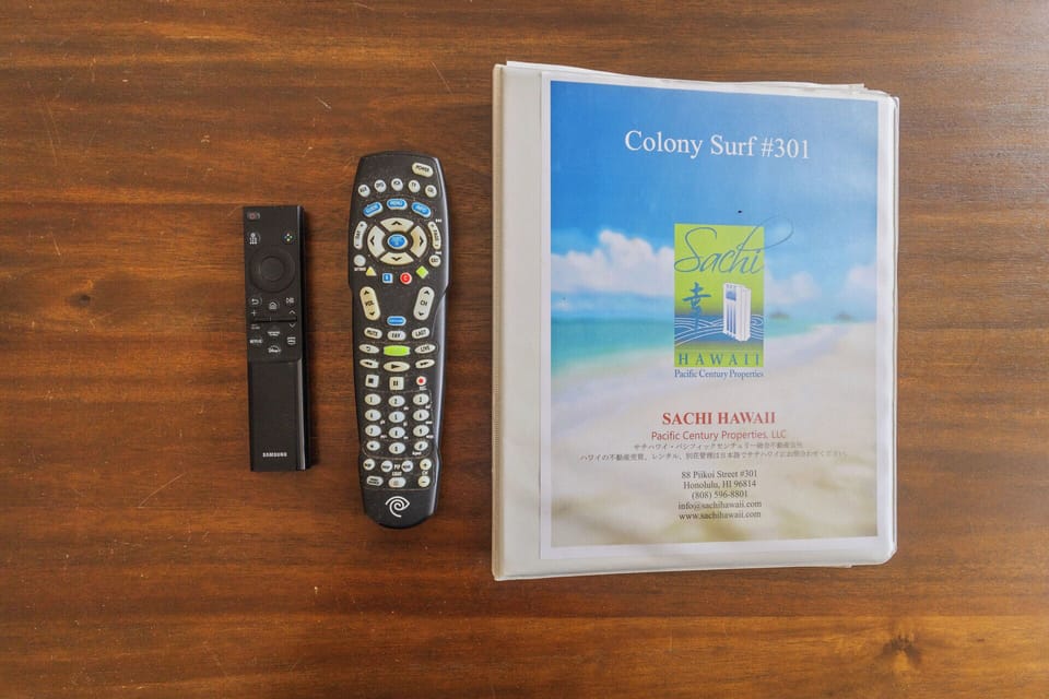 Living Room - located on the living room coffee table you will find remote controls for the flat-screen tv and our Colony Surf #301 guest manual.