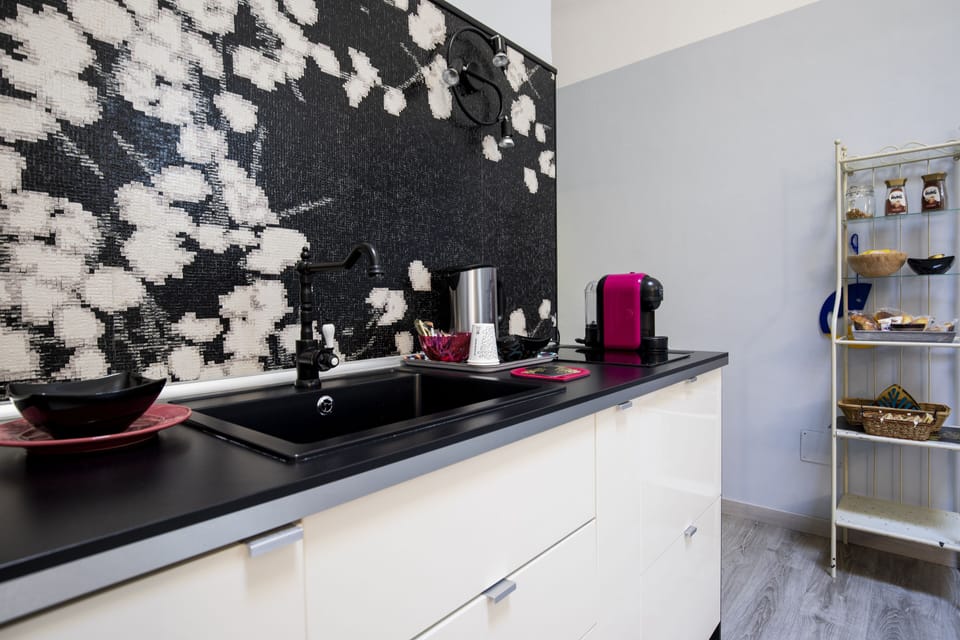 Deluxe Suite, 2 Bedrooms (Home Naples) | Private kitchen | Fridge, stovetop, espresso maker, coffee/tea maker