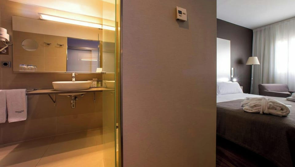 Pillowtop beds, minibar, in-room safe, desk