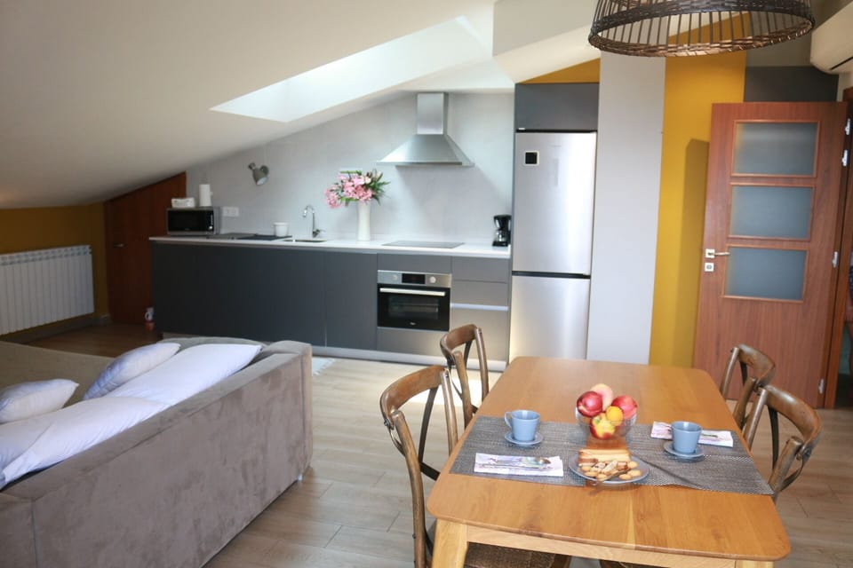 Deluxe Apartment, Sea View | Living area | Flat-screen TV