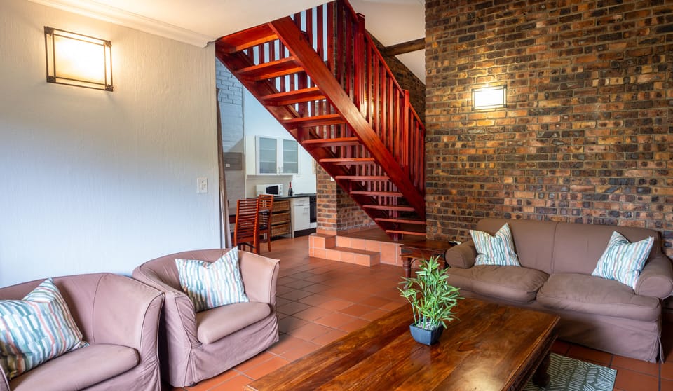 Family Apartment, 3 Bedrooms | Living area | 40-inch LED TV with satellite channels