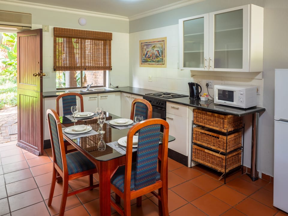 Family Apartment, 2 Bedrooms | Private kitchen | Coffee/tea maker, electric kettle