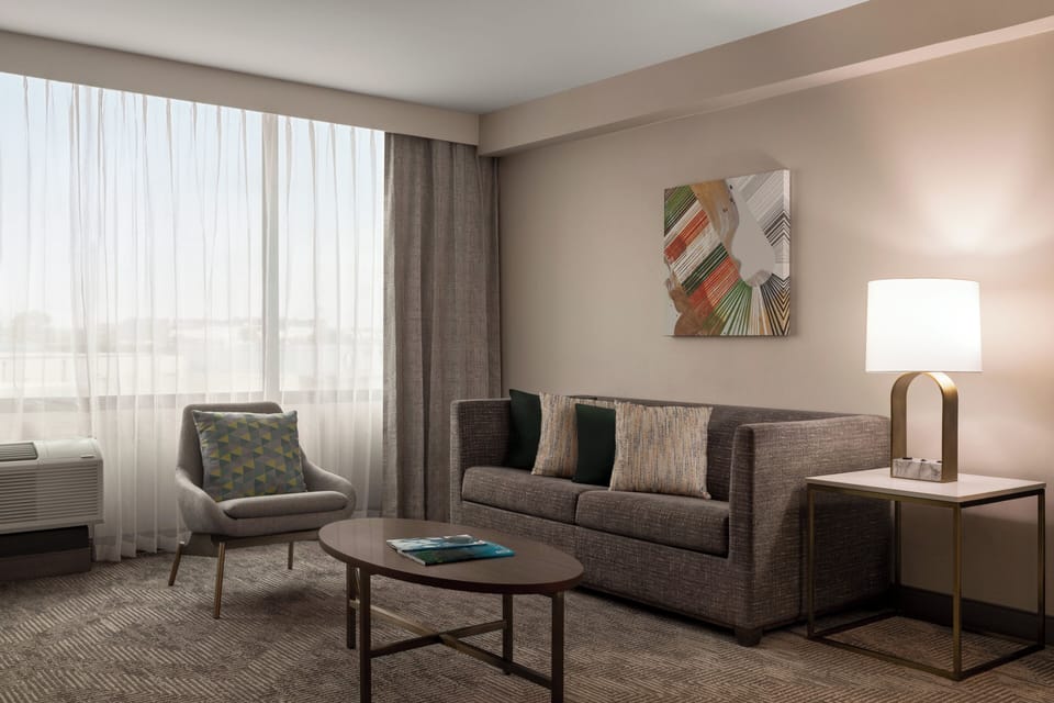 Suite, 1 Bedroom | In-room safe, desk, laptop workspace, iron/ironing board