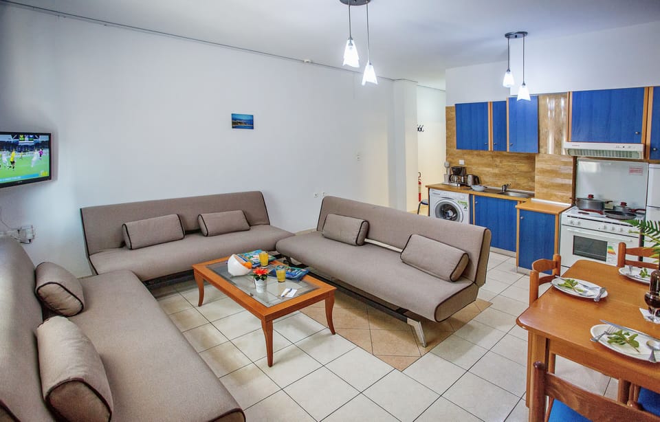 Apartment (5 Adults) | Living area | 32-inch flat-screen TV with digital channels, TV