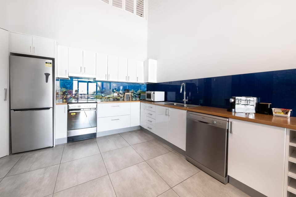 Superior Apartment, 4 Bedrooms | Private kitchen | Fridge, microwave, coffee/tea maker, electric kettle