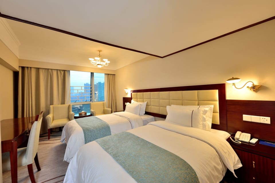 Premium bedding, free minibar items, in-room safe, desk