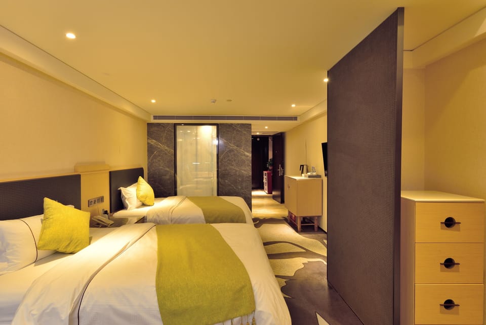 Premium bedding, free minibar items, in-room safe, desk