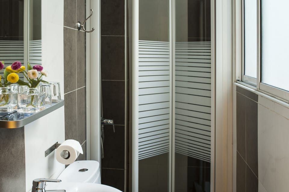 Shower, free toiletries, hair dryer, towels