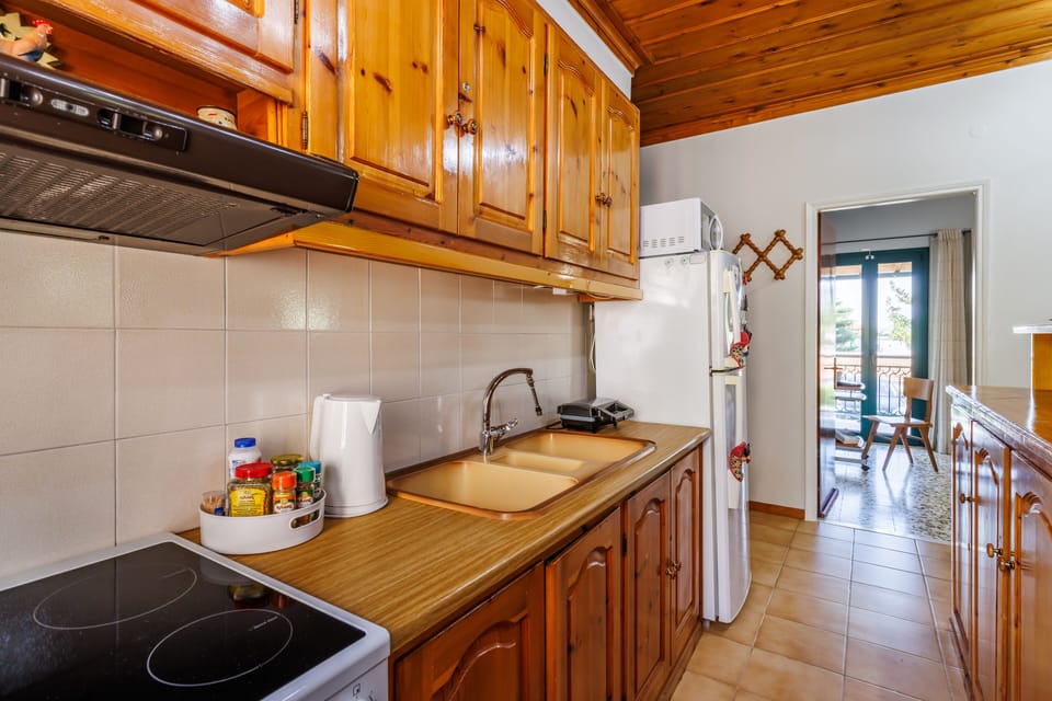 Family Villa, Partial Sea View | Shared kitchen facilities | Full-size fridge, microwave, oven, stovetop
