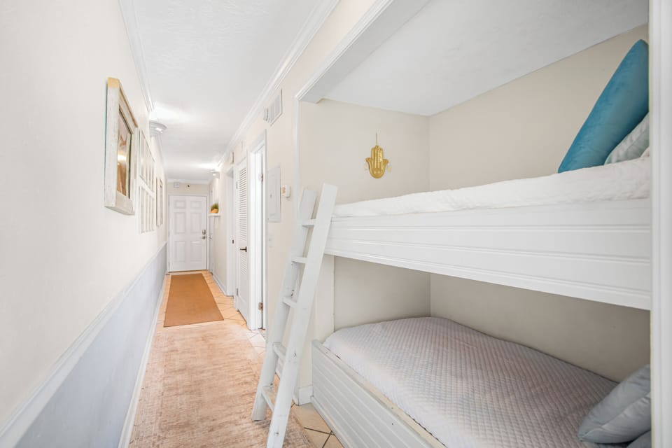 Twin bunkbed in the hallway nook.