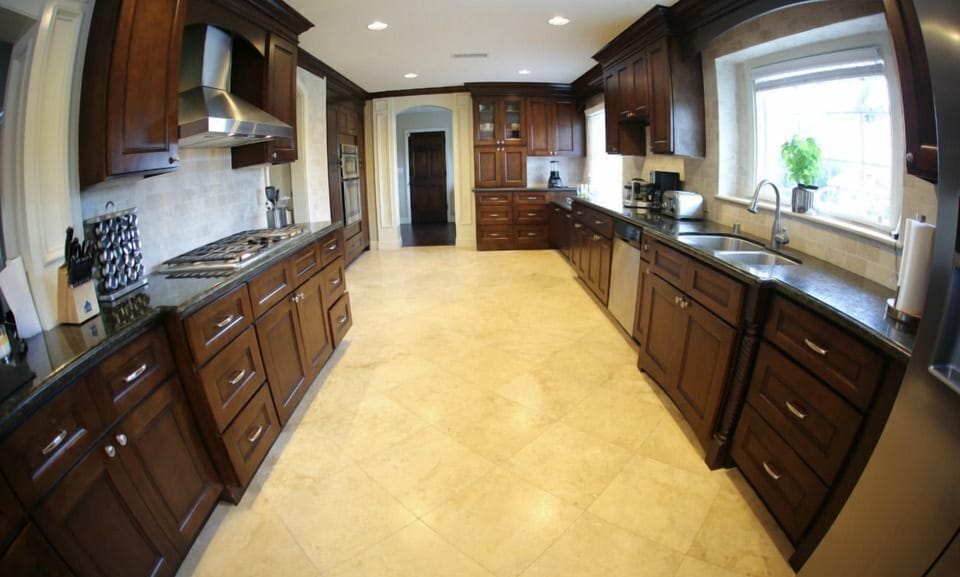 Gourmet Kitchen with Granite Countertops, Stainless Steel Appliances and Travertine Floors