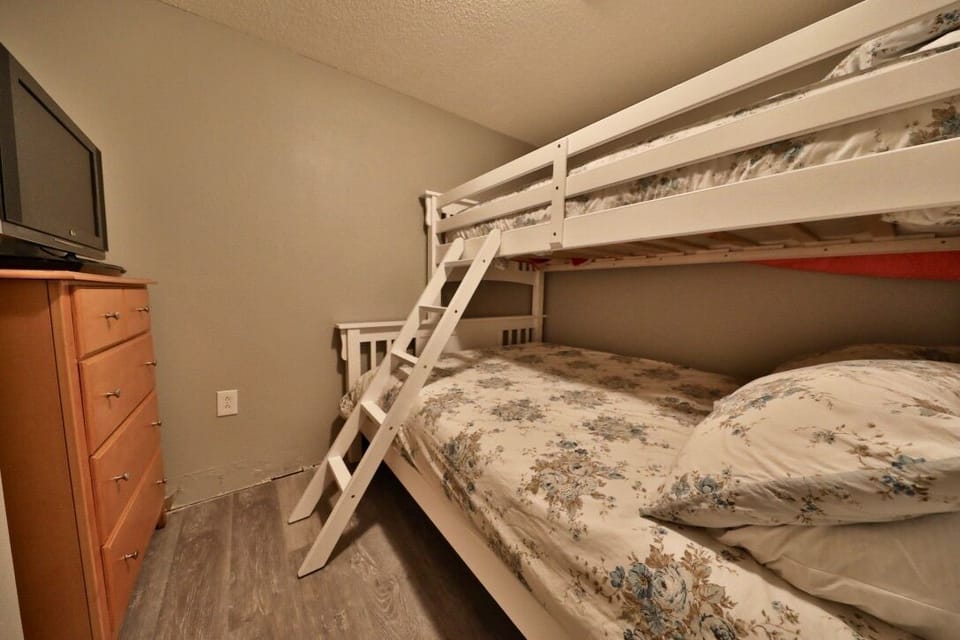 Flatscreen TV in the 4th bedroom.