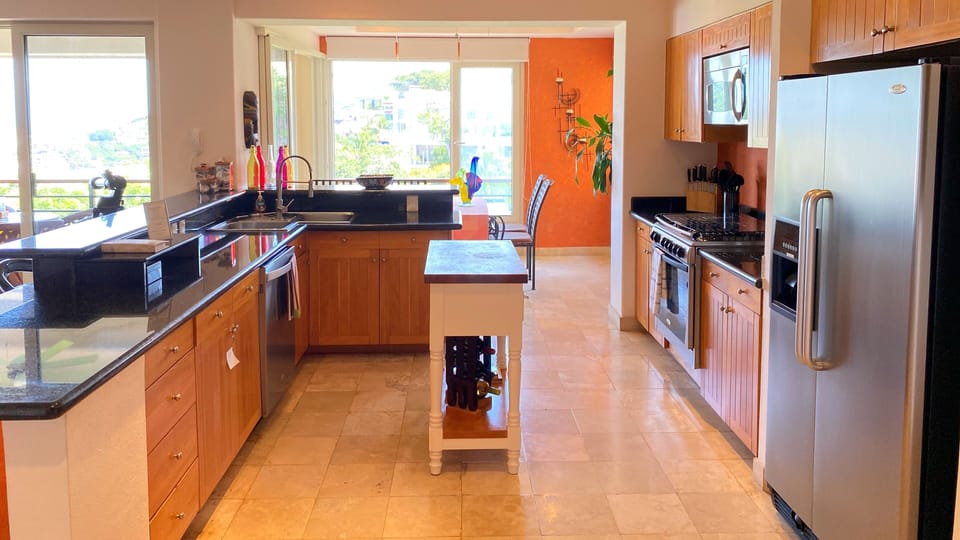 Comfort Condo, Kitchen, Ocean View | Private kitchen | Fridge, microwave, oven, stovetop