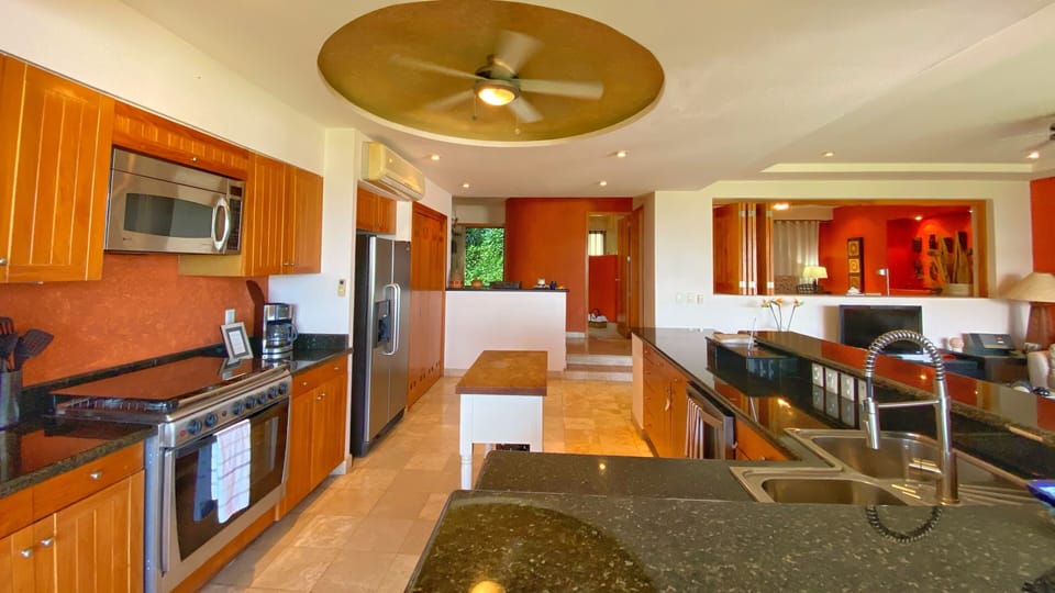 Comfort Condo, Kitchen, Ocean View | Private kitchen | Fridge, microwave, oven, stovetop